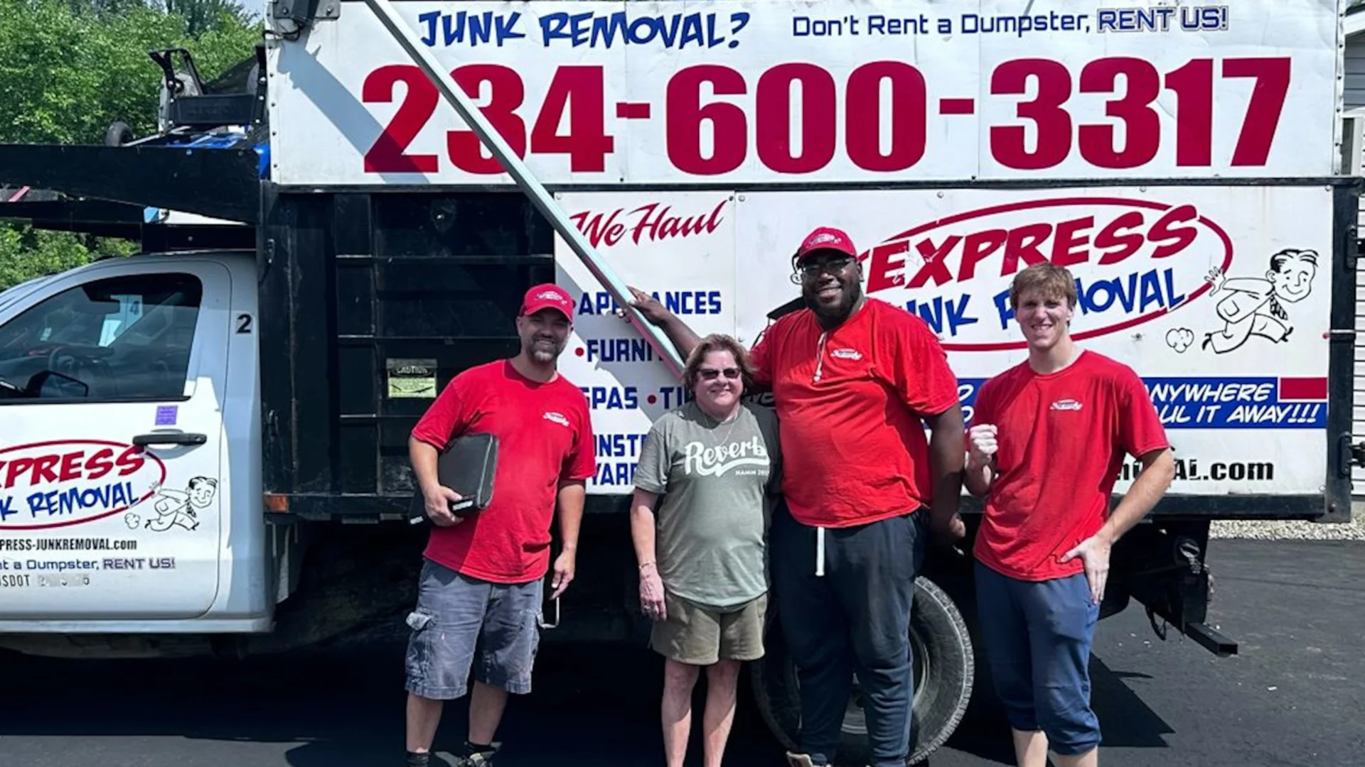 Express Junk Removal crew loading truck — junk removal and hauling service Northeast Ohio