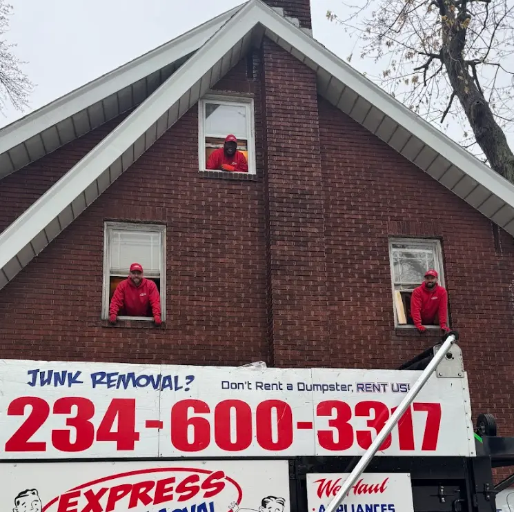 Truck team cleanig out attic